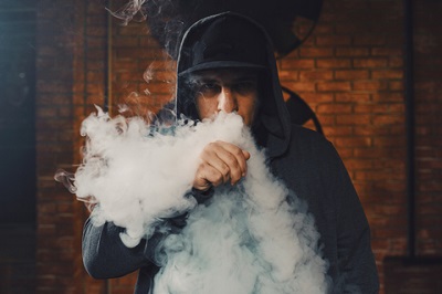 Man In A Hoodie Vaping