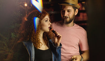 Friends hanging out vaping together