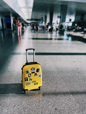 Yellow suitcase in airport