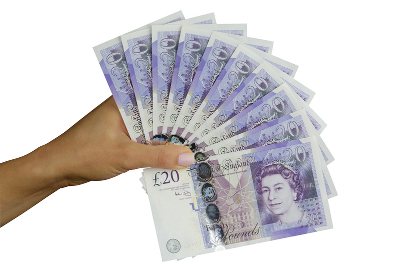 Man Holding Multiple £20 Notes