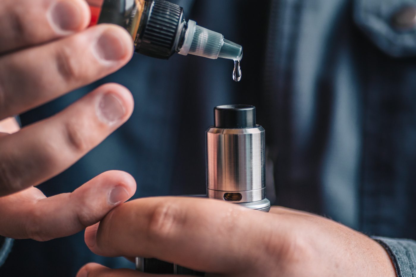 Refilling vape kit with e-liquid