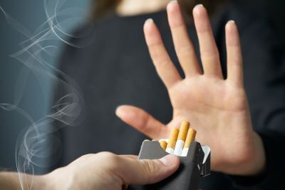  Hand gesturing to say no to cigarettes 