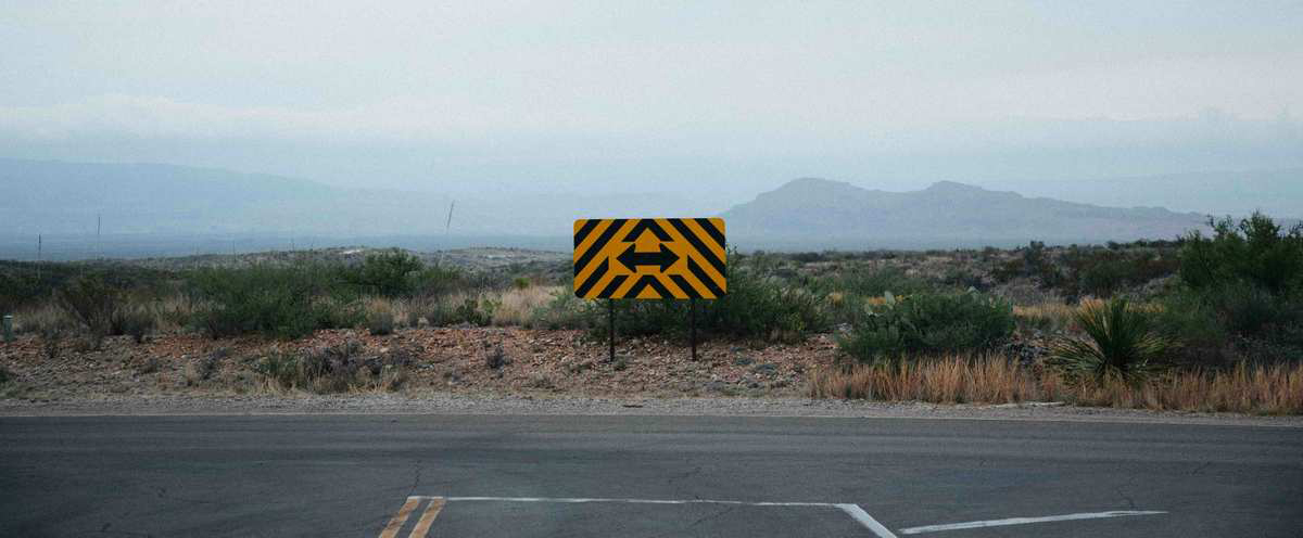 Road with sign showing two paths
