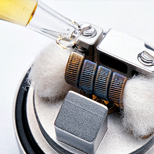 Vape Coil Wire Saturated With E-Liquid