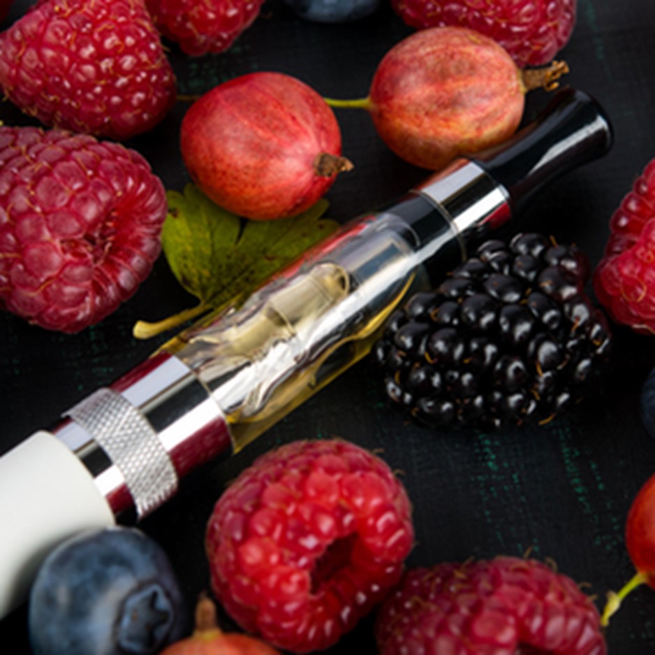Vape Pen Surrounded by Fruits