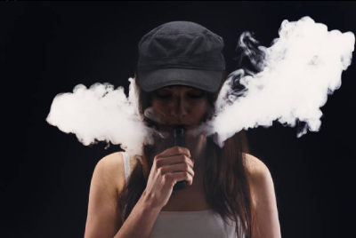 Young Woman Vaping