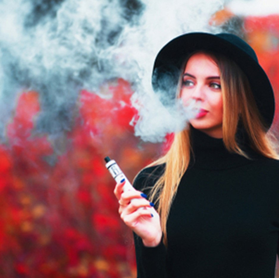 Woman Blowing Vape Cloud