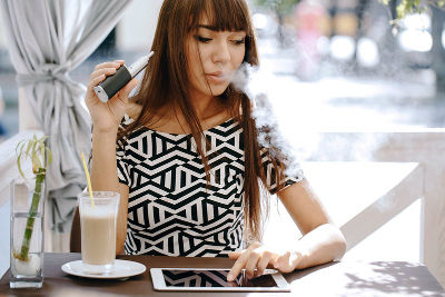 Woman Vaping