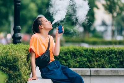 Woman Vaping