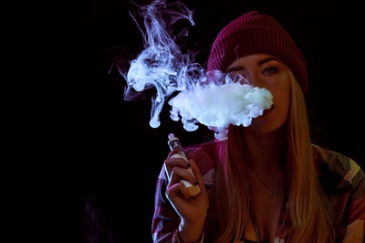 Young Woman Vaping